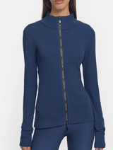 Navy blue long sleeve with zip down the centre.