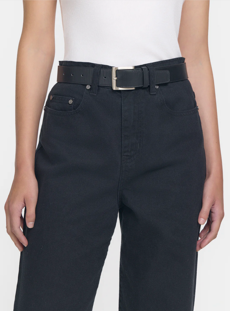 Black straight leg jean with side spit at ankle, perfect to pair with a heeled shoe.